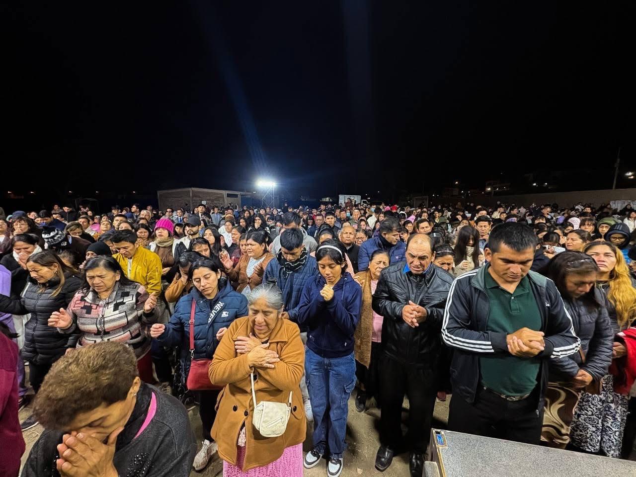A crowd gathered for prayer at the Peru Gospel crusade